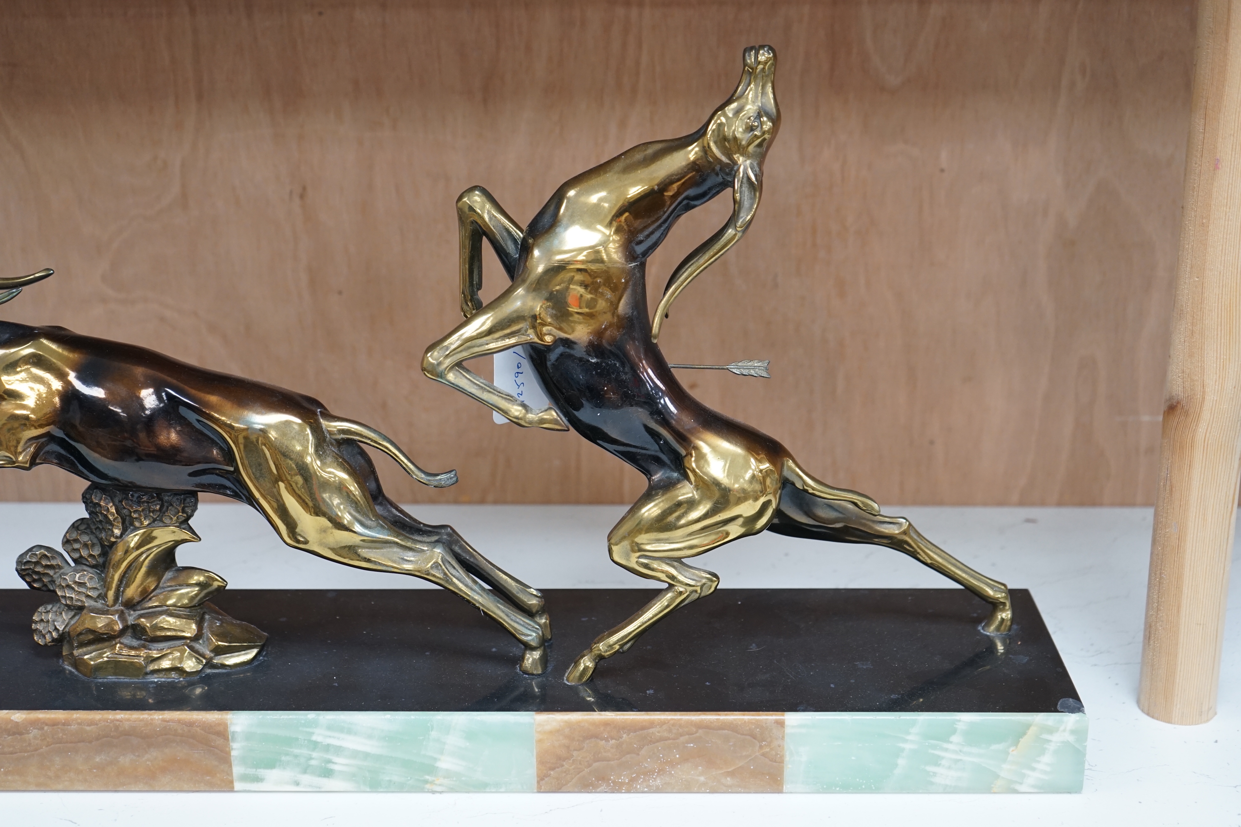 An Art Deco antelope group on marble base, signed, Limousin, 70cm